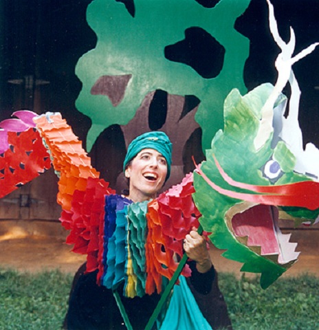 Picture of Janet Fishman dressed in a dragon suit